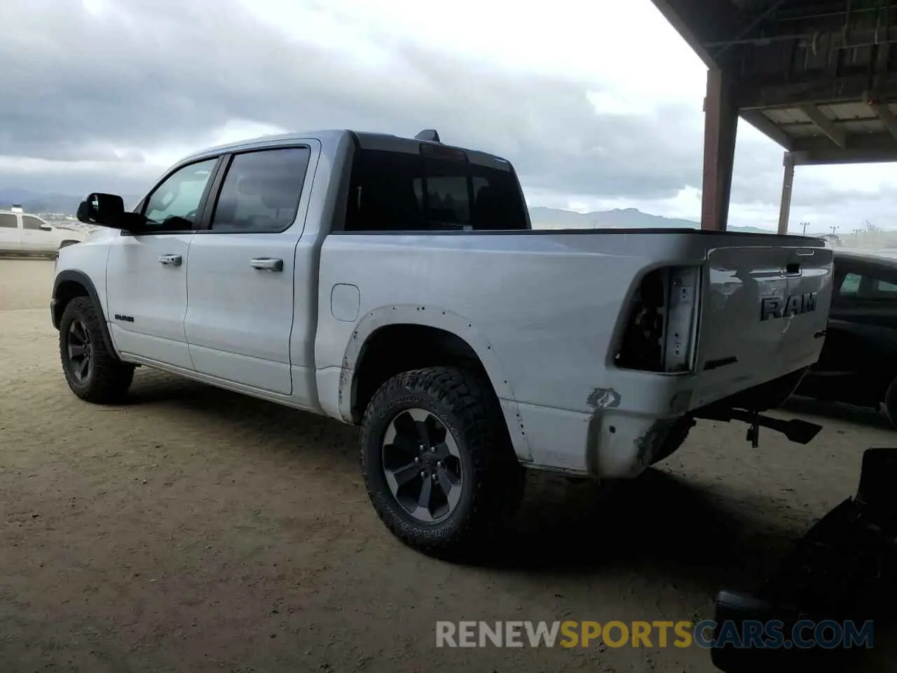 2 Photograph of a damaged car 1C6SRFLTXKN618849 RAM 1500 2019