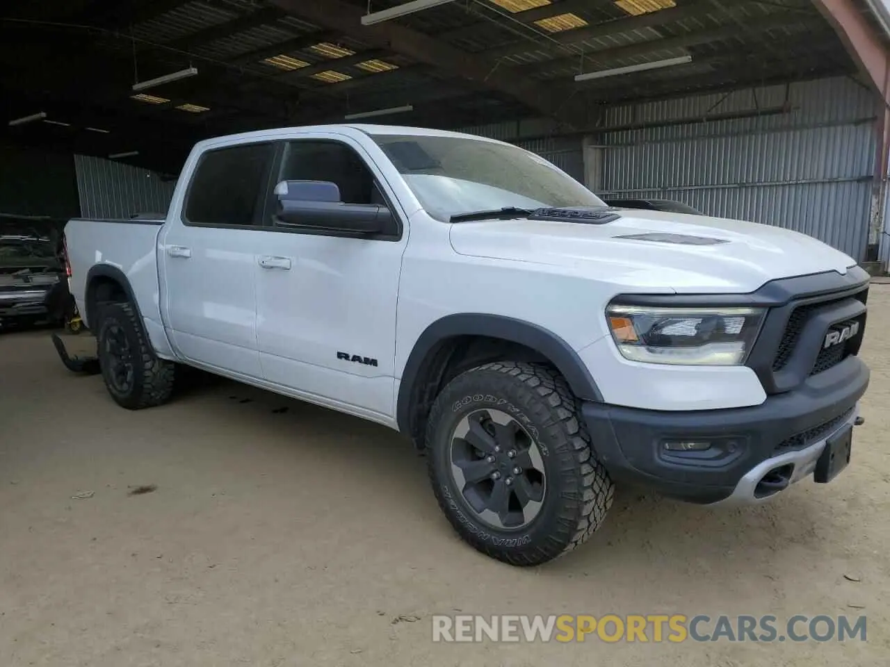 4 Photograph of a damaged car 1C6SRFLTXKN618849 RAM 1500 2019