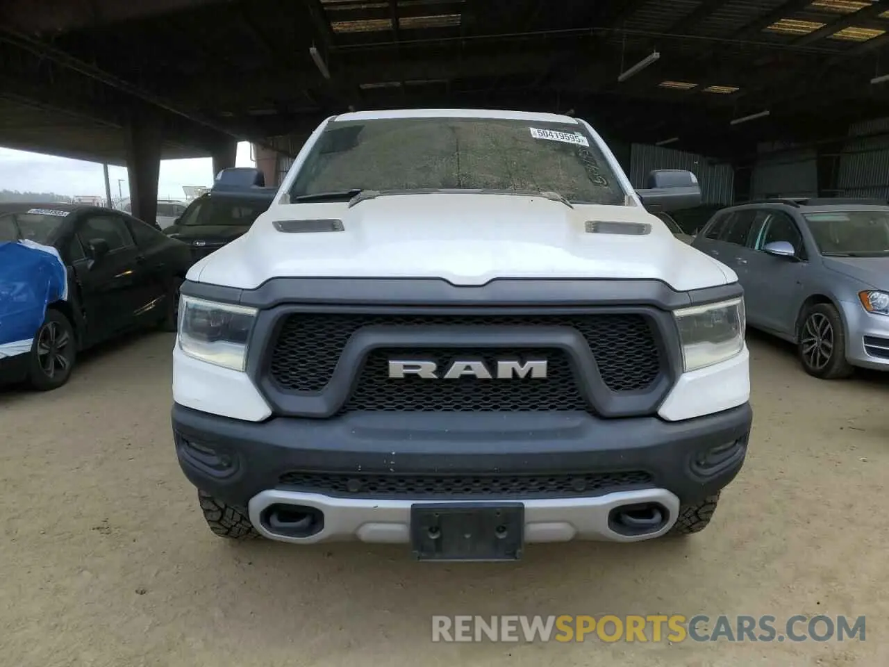 5 Photograph of a damaged car 1C6SRFLTXKN618849 RAM 1500 2019