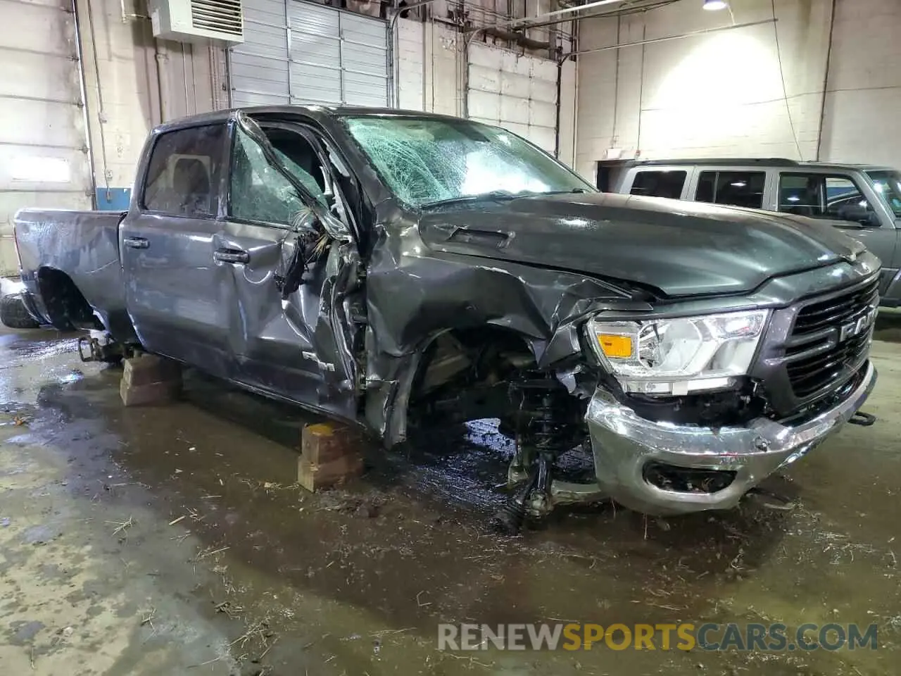 4 Photograph of a damaged car 1C6SRFMT3KN691897 RAM 1500 2019