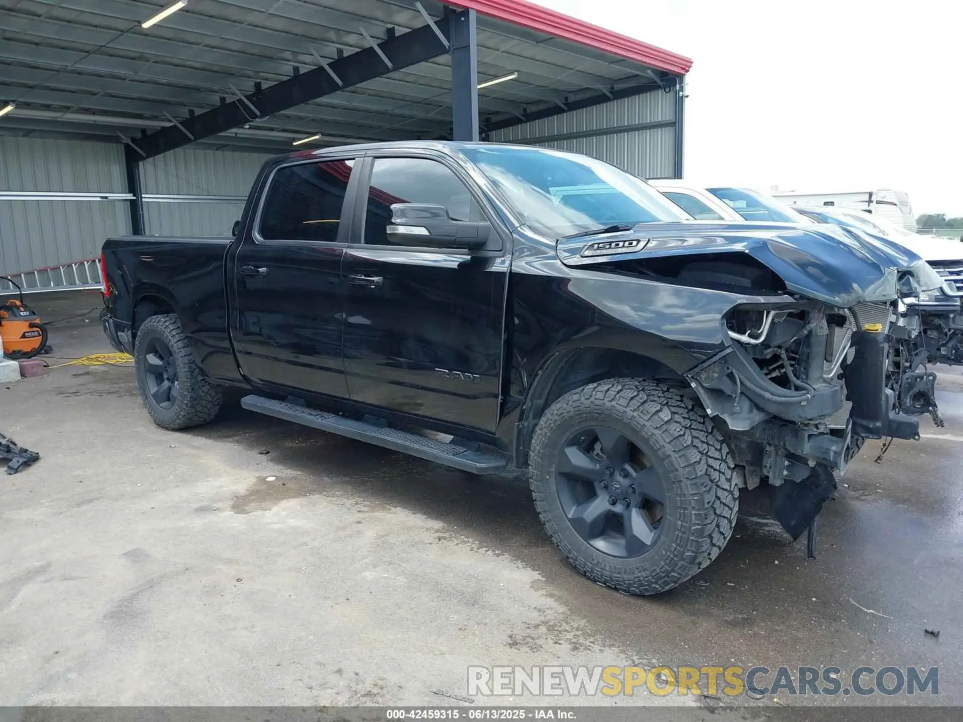 1 Photograph of a damaged car 1C6SRFMT7KN736680 RAM 1500 2019
