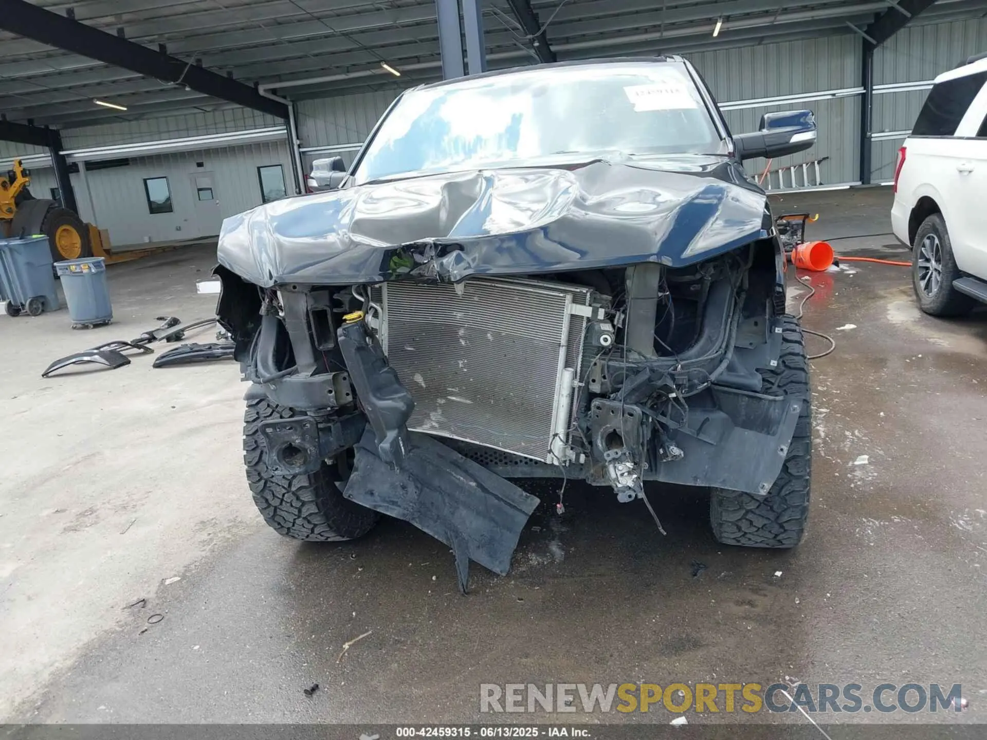 13 Photograph of a damaged car 1C6SRFMT7KN736680 RAM 1500 2019