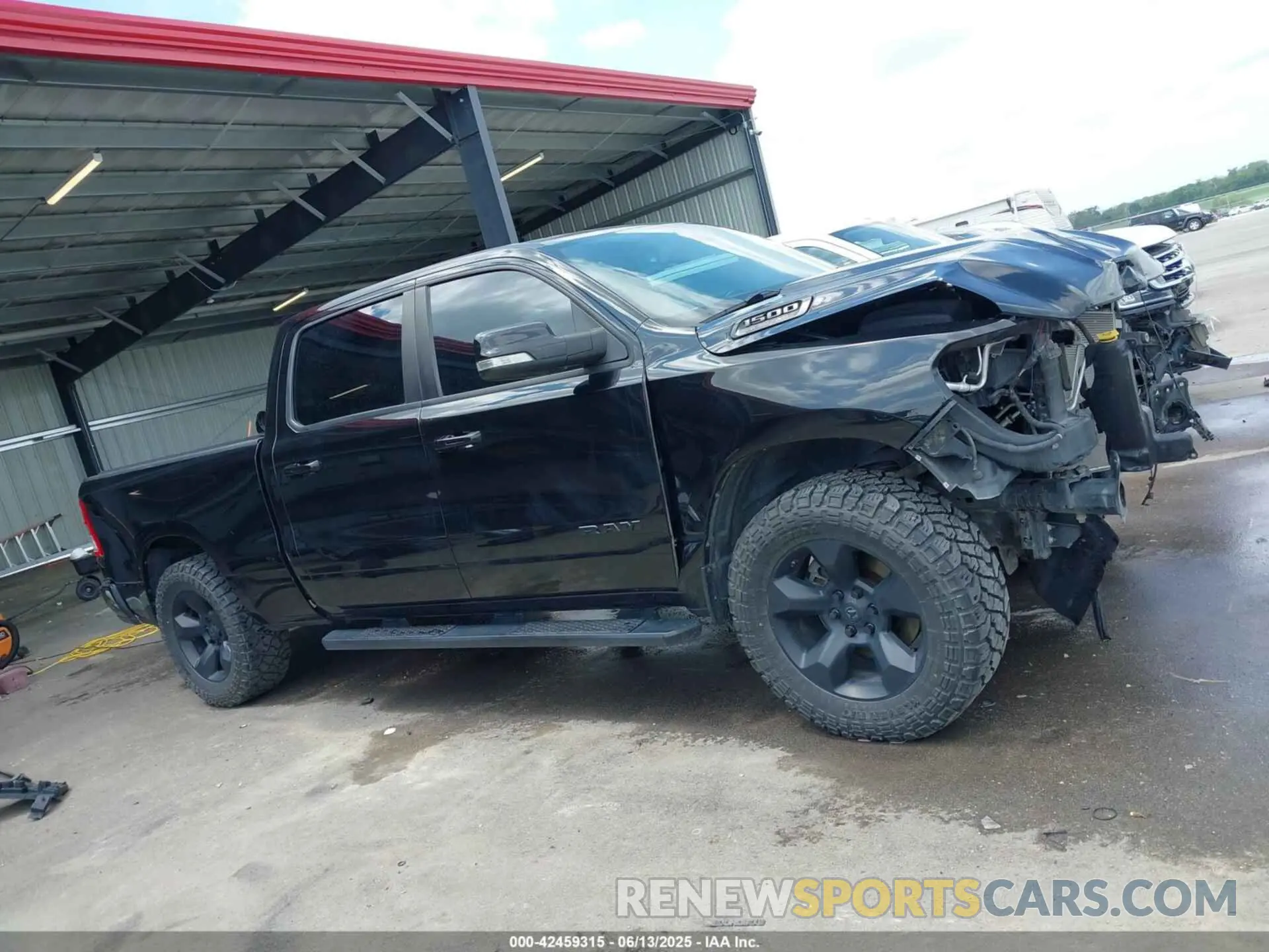 14 Photograph of a damaged car 1C6SRFMT7KN736680 RAM 1500 2019