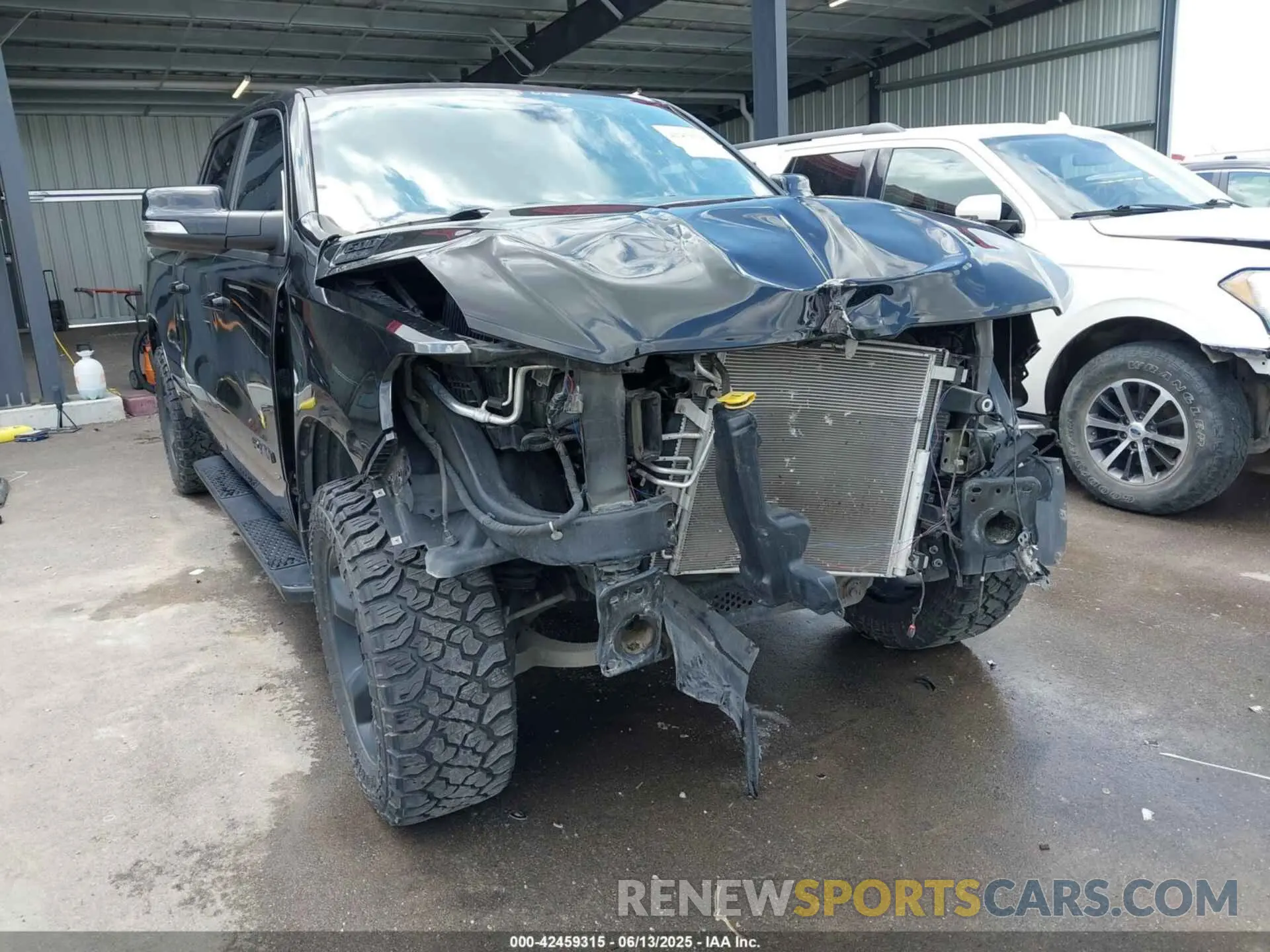 6 Photograph of a damaged car 1C6SRFMT7KN736680 RAM 1500 2019