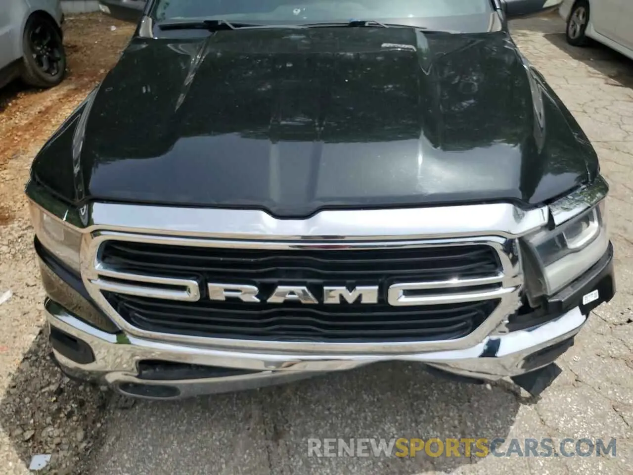11 Photograph of a damaged car 1C6SRFMT8KN637611 RAM 1500 2019