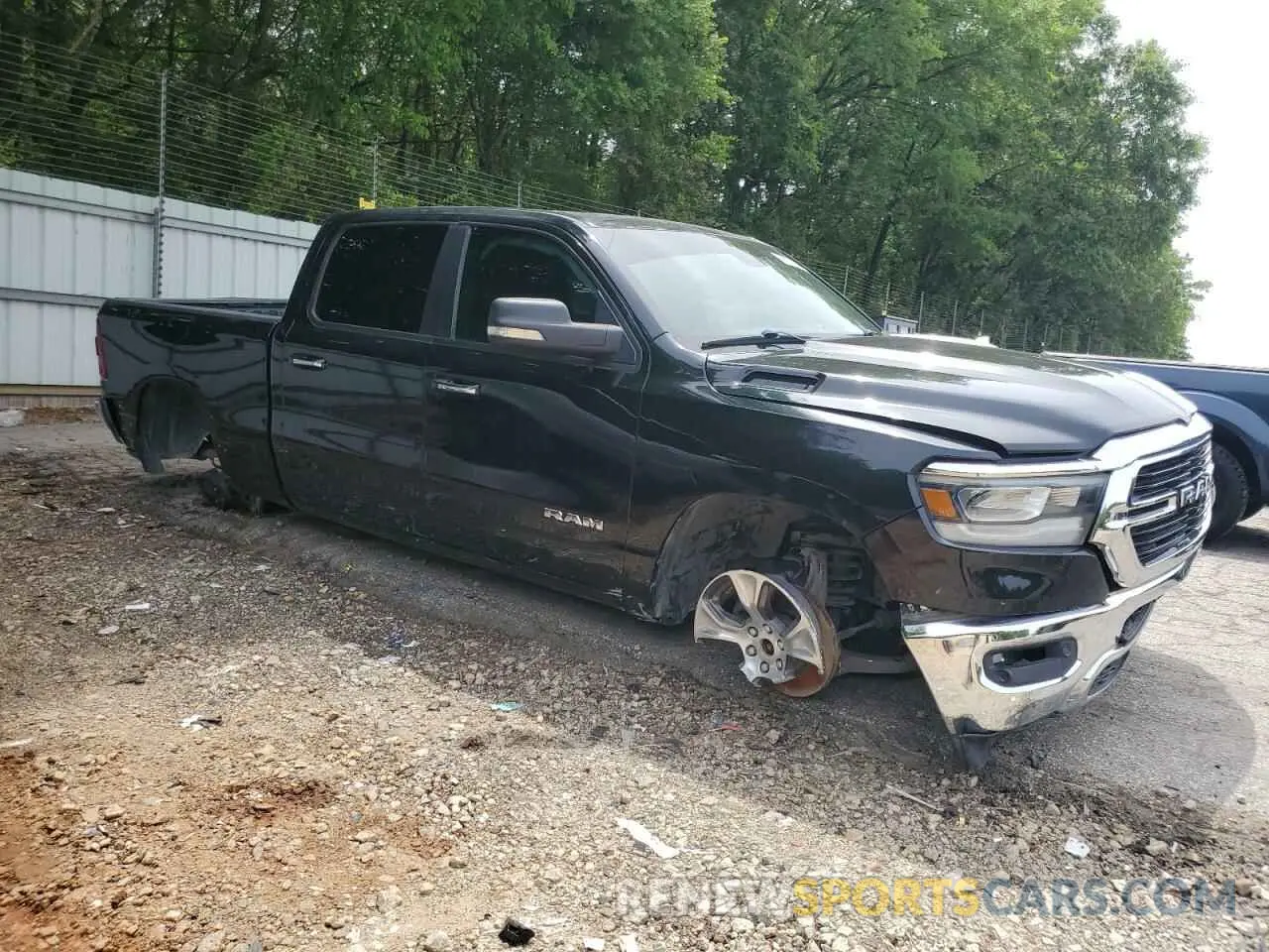 4 Photograph of a damaged car 1C6SRFMT8KN637611 RAM 1500 2019