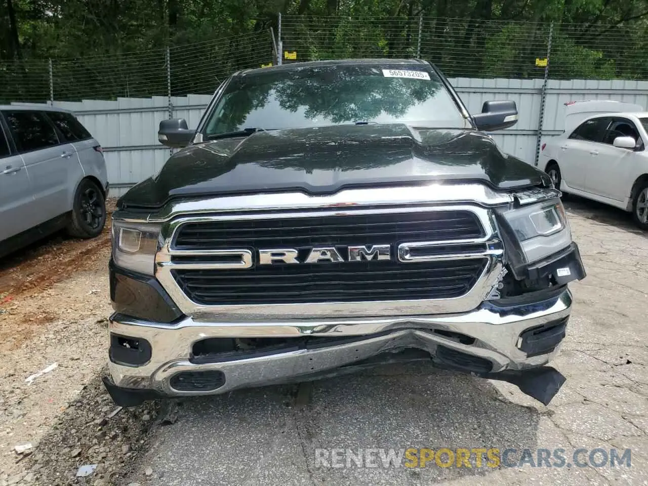 5 Photograph of a damaged car 1C6SRFMT8KN637611 RAM 1500 2019