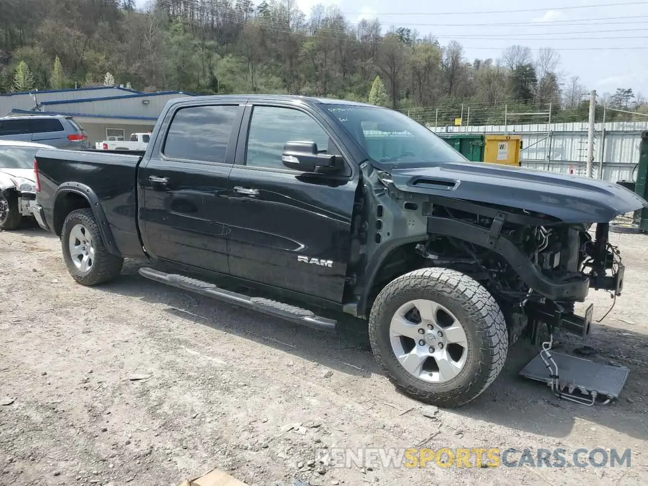 4 Photograph of a damaged car 1C6SRFMT8KN864295 RAM 1500 2019