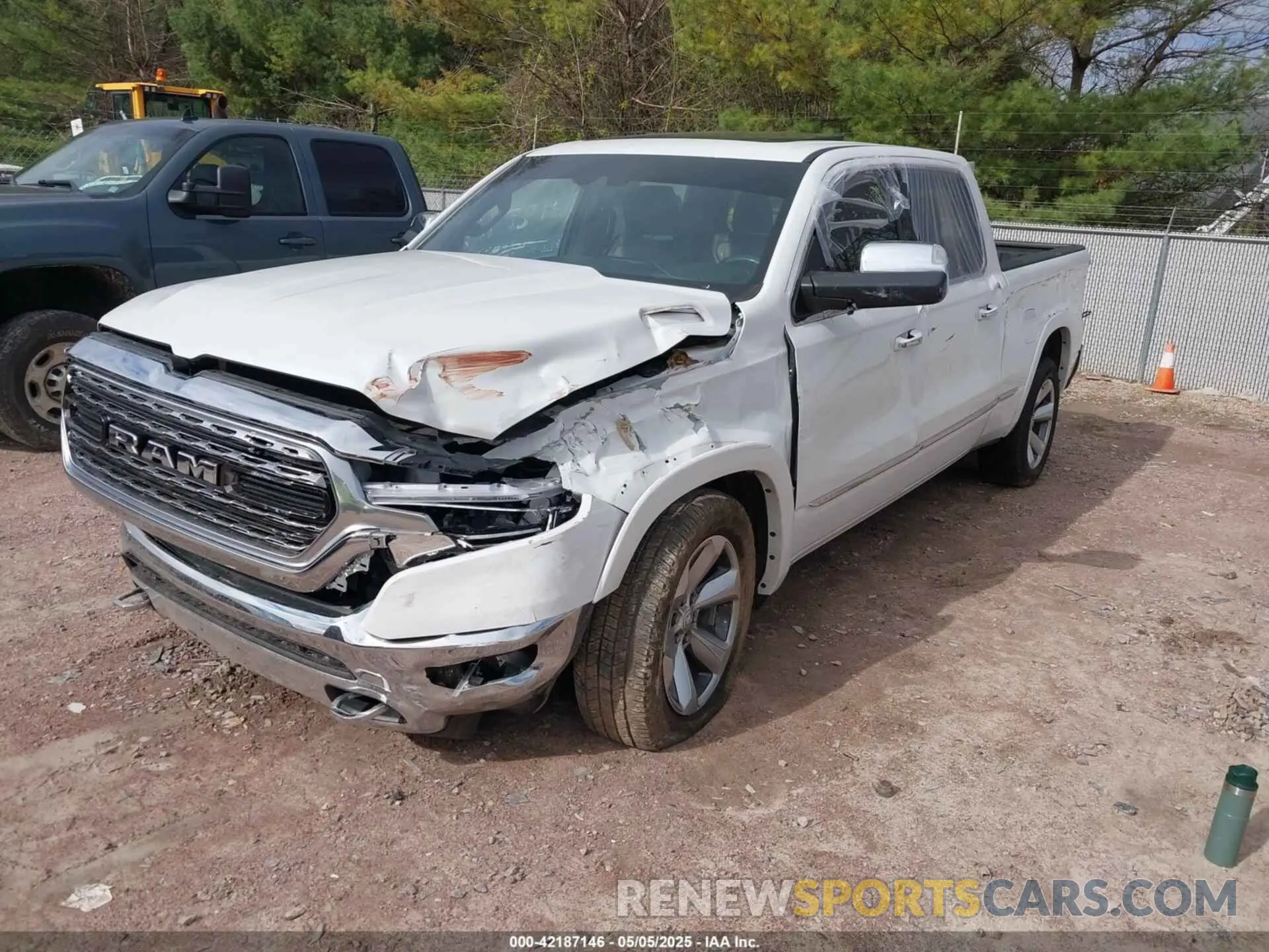2 Photograph of a damaged car 1C6SRFPT2KN508369 RAM 1500 2019