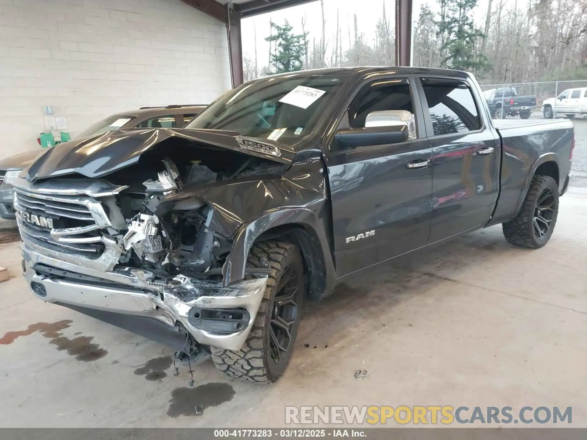 2 Photograph of a damaged car 1C6SRFRT9KN878862 RAM 1500 2019