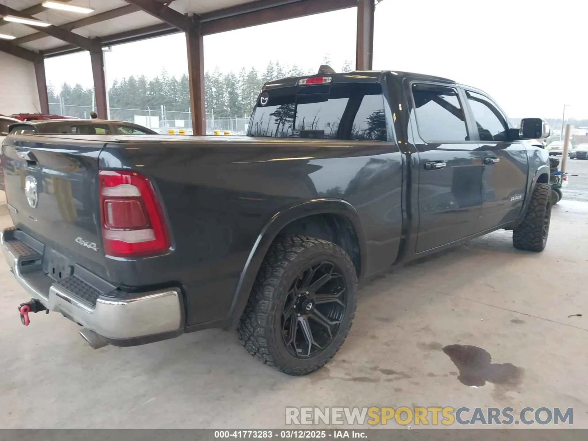 4 Photograph of a damaged car 1C6SRFRT9KN878862 RAM 1500 2019