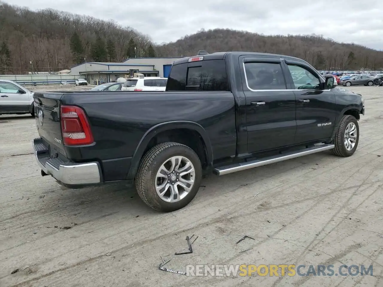 3 Photograph of a damaged car 1C6SRFST6KN573300 RAM 1500 2019