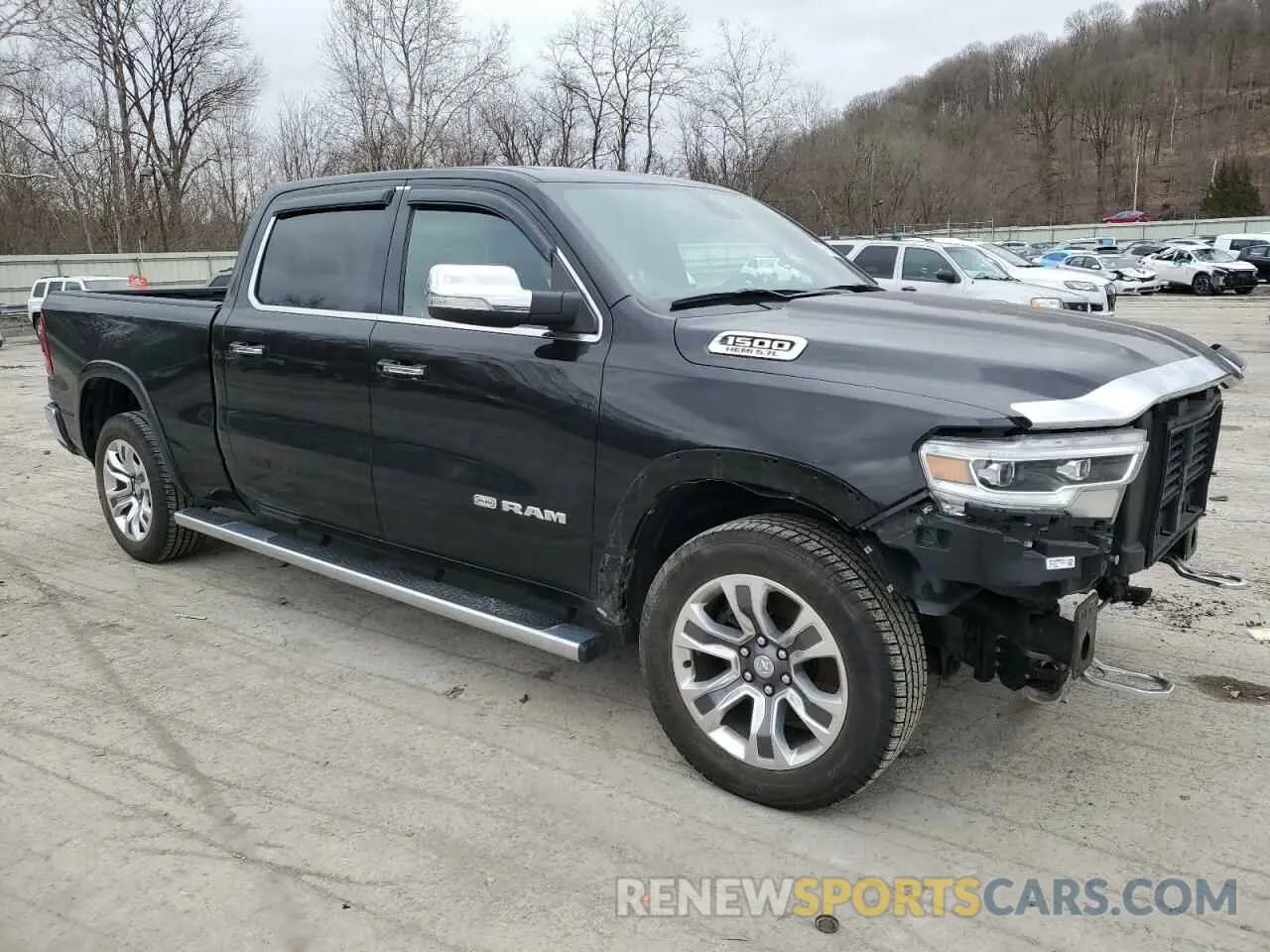 4 Photograph of a damaged car 1C6SRFST6KN573300 RAM 1500 2019