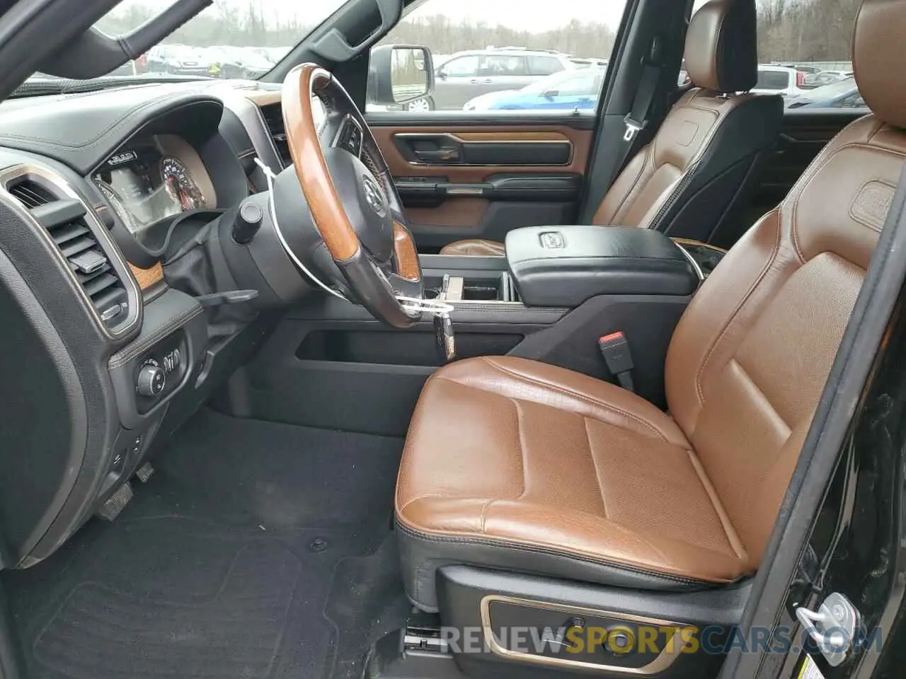 7 Photograph of a damaged car 1C6SRFST6KN573300 RAM 1500 2019