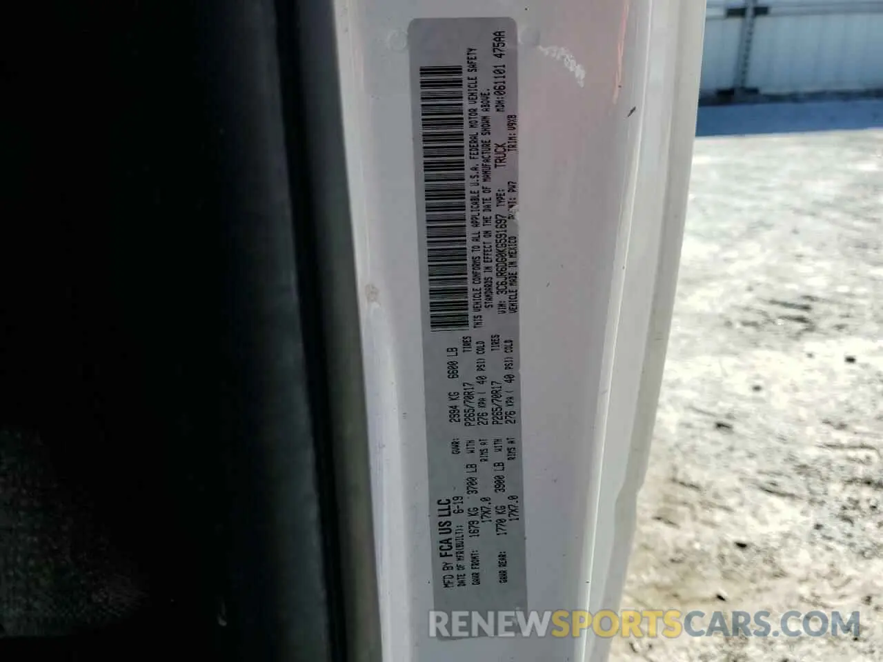 12 Photograph of a damaged car 3C6JR6DG0KG591697 RAM 1500 2019