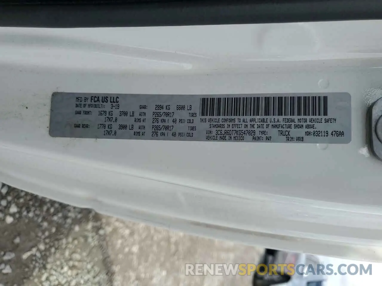 12 Photograph of a damaged car 3C6JR6DT7KG547029 RAM 1500 2019