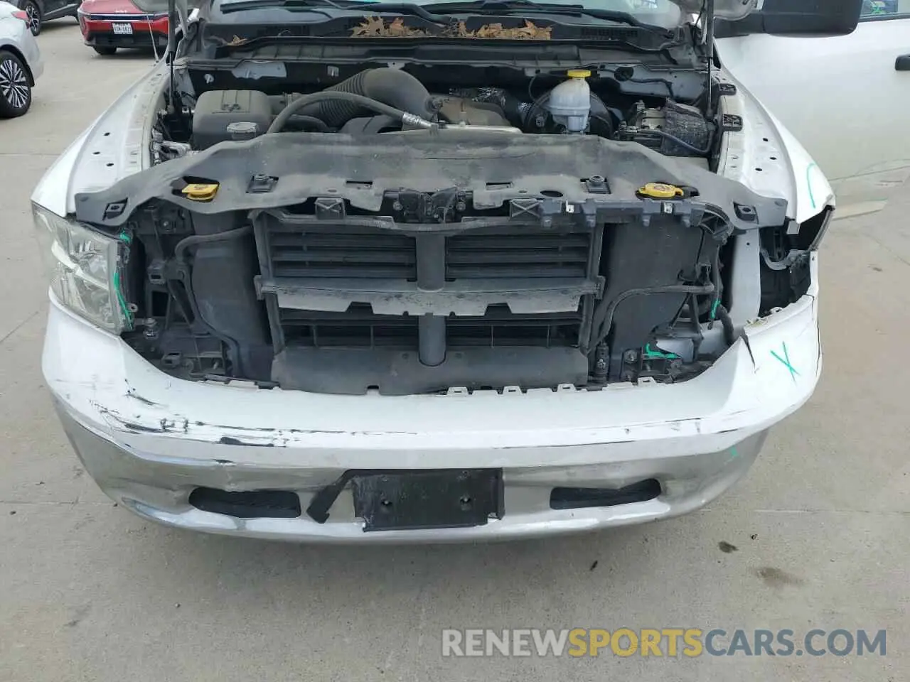 11 Photograph of a damaged car 3C6JR6DTXKG537952 RAM 1500 2019