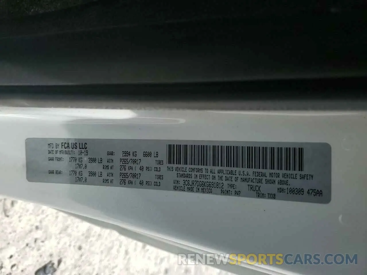 12 Photograph of a damaged car 3C6JR7DG6KG691812 RAM 1500 2019