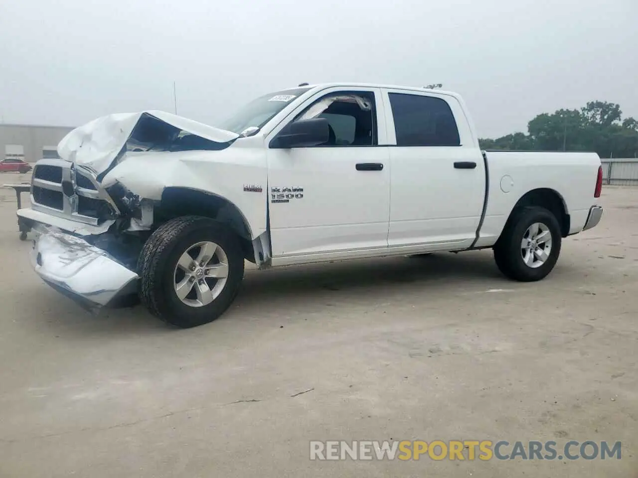 1 Photograph of a damaged car 3C6RR6KTXKG722928 RAM 1500 2019
