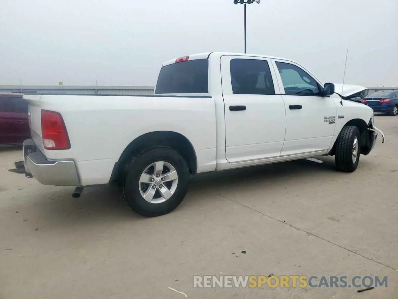 3 Photograph of a damaged car 3C6RR6KTXKG722928 RAM 1500 2019