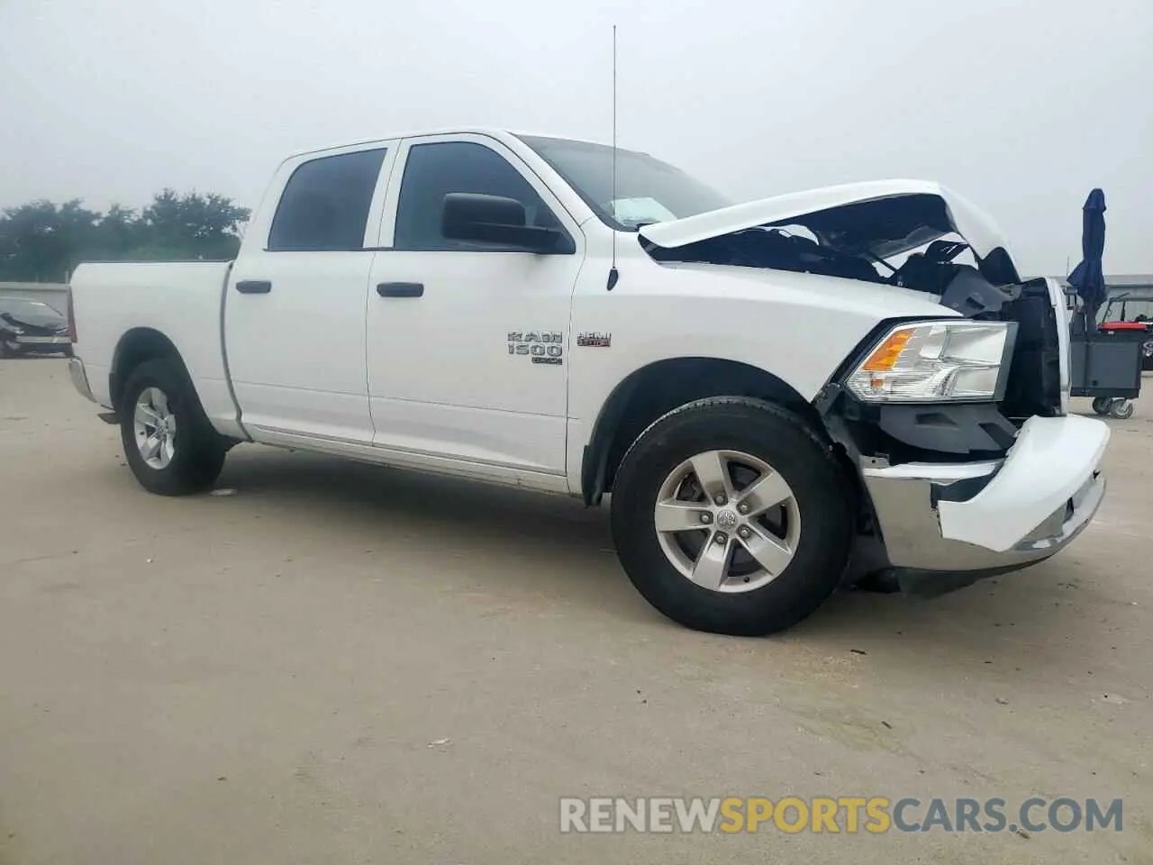 4 Photograph of a damaged car 3C6RR6KTXKG722928 RAM 1500 2019