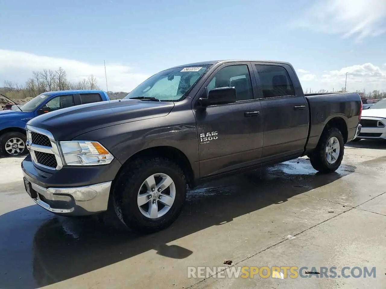 1 Photograph of a damaged car 1C6RR6KG8LS137858 RAM 1500 2020