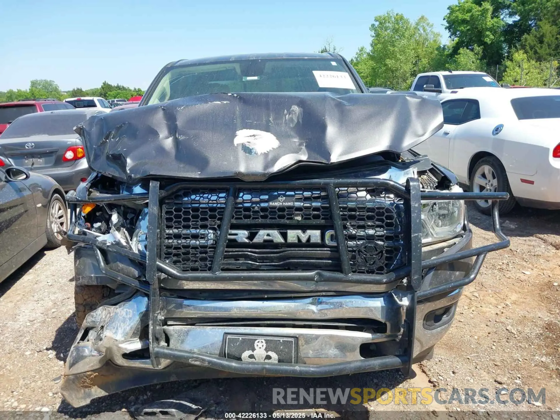 12 Photograph of a damaged car 1C6RREFT0LN209779 RAM 1500 2020