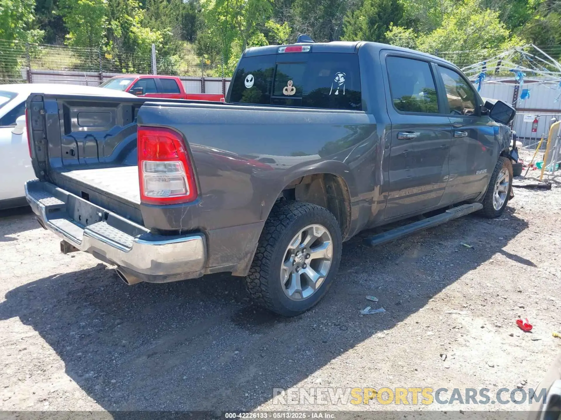 4 Photograph of a damaged car 1C6RREFT0LN209779 RAM 1500 2020