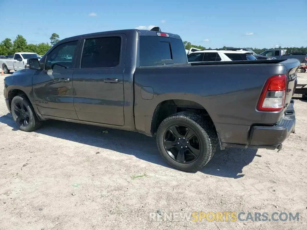 2 Photograph of a damaged car 1C6RREFT0LN406189 RAM 1500 2020