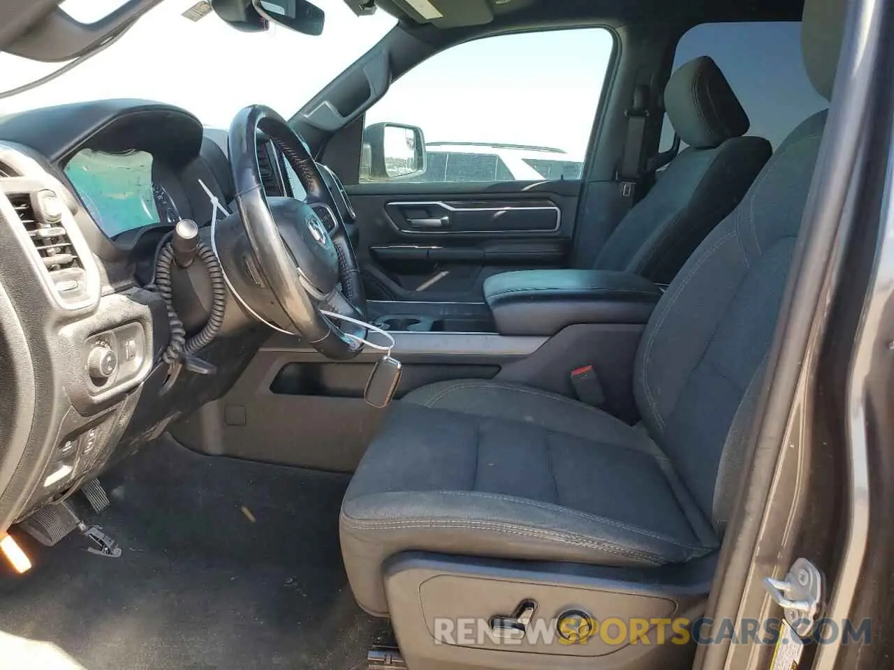 7 Photograph of a damaged car 1C6RREFT0LN406189 RAM 1500 2020