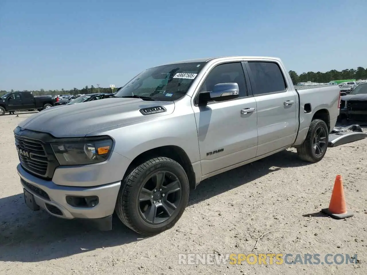 1 Photograph of a damaged car 1C6RREFT2LN129030 RAM 1500 2020