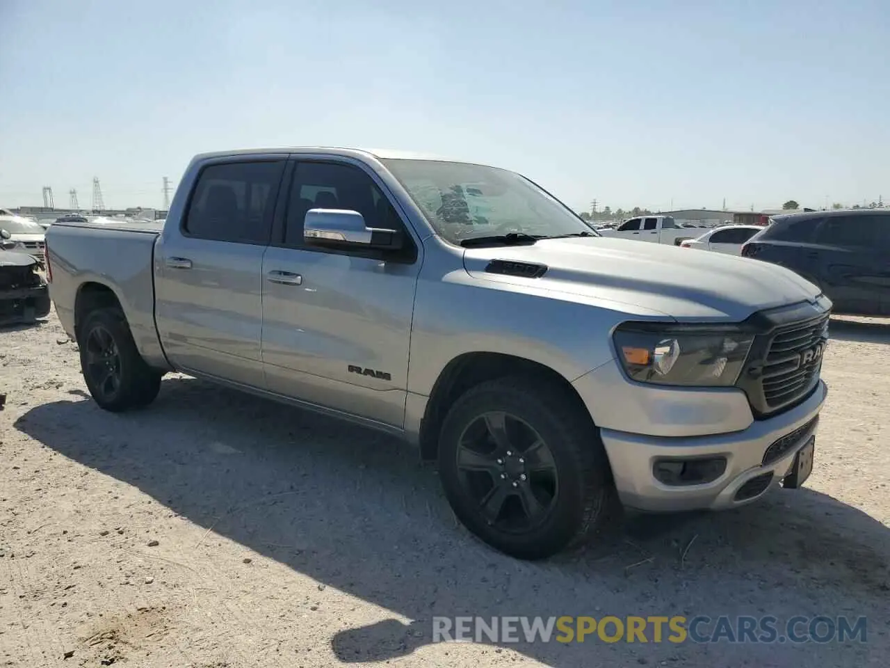 4 Photograph of a damaged car 1C6RREFT2LN129030 RAM 1500 2020