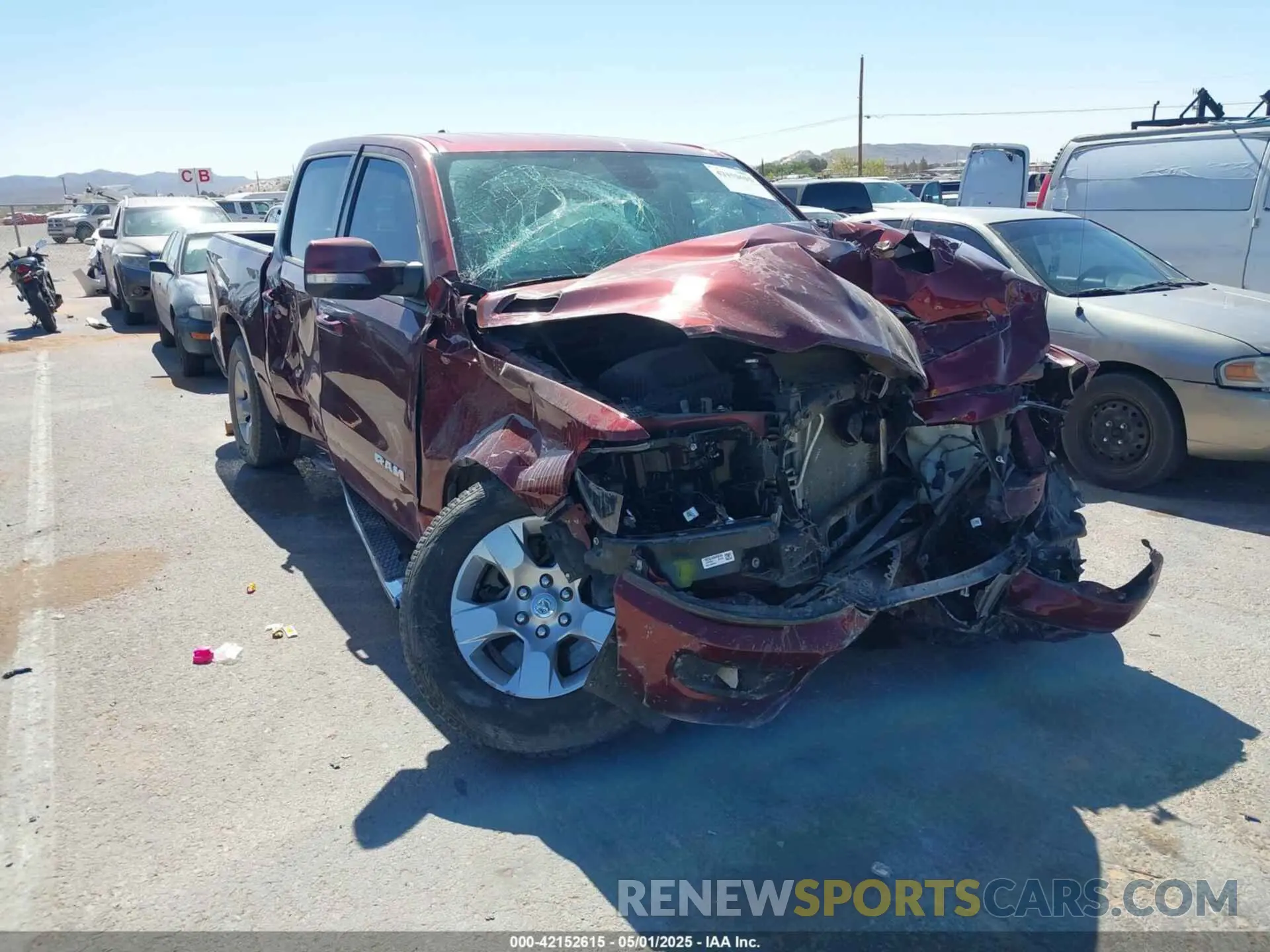 1 Photograph of a damaged car 1C6RREFT2LN209900 RAM 1500 2020