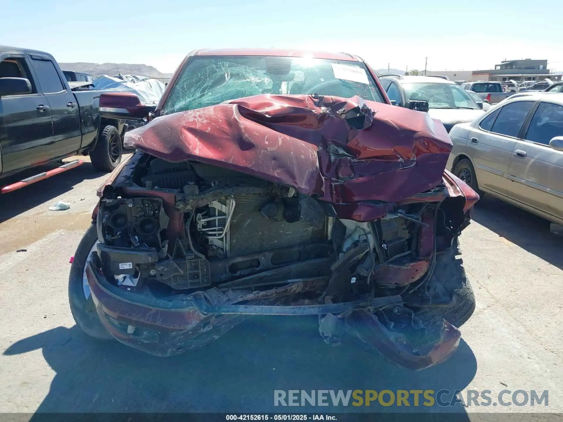 12 Photograph of a damaged car 1C6RREFT2LN209900 RAM 1500 2020
