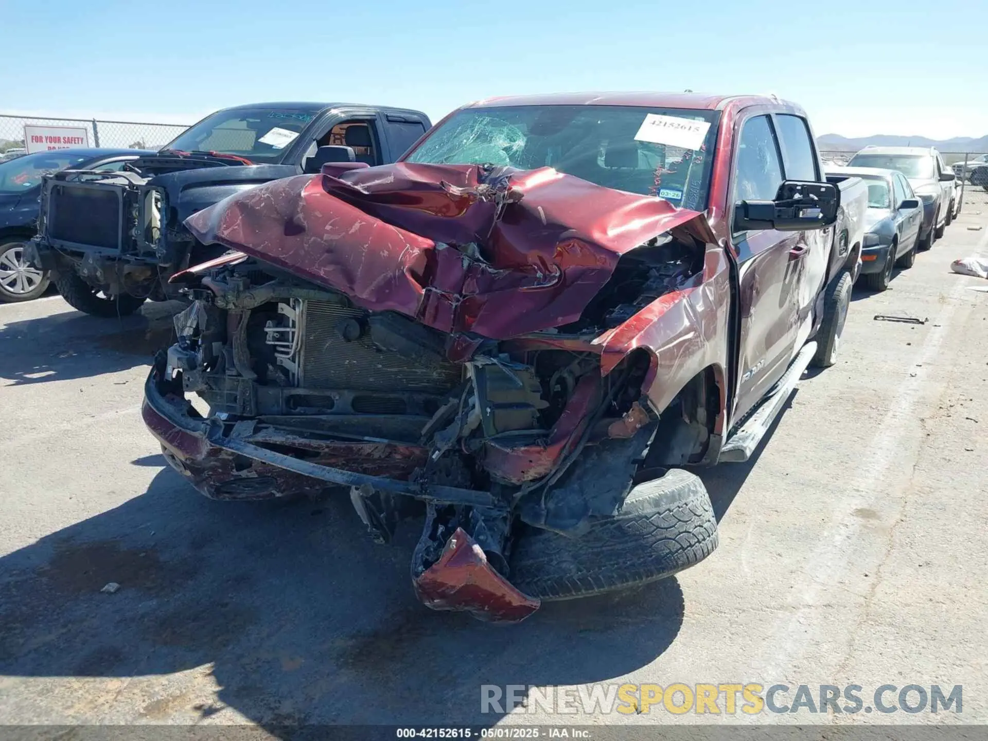 2 Photograph of a damaged car 1C6RREFT2LN209900 RAM 1500 2020