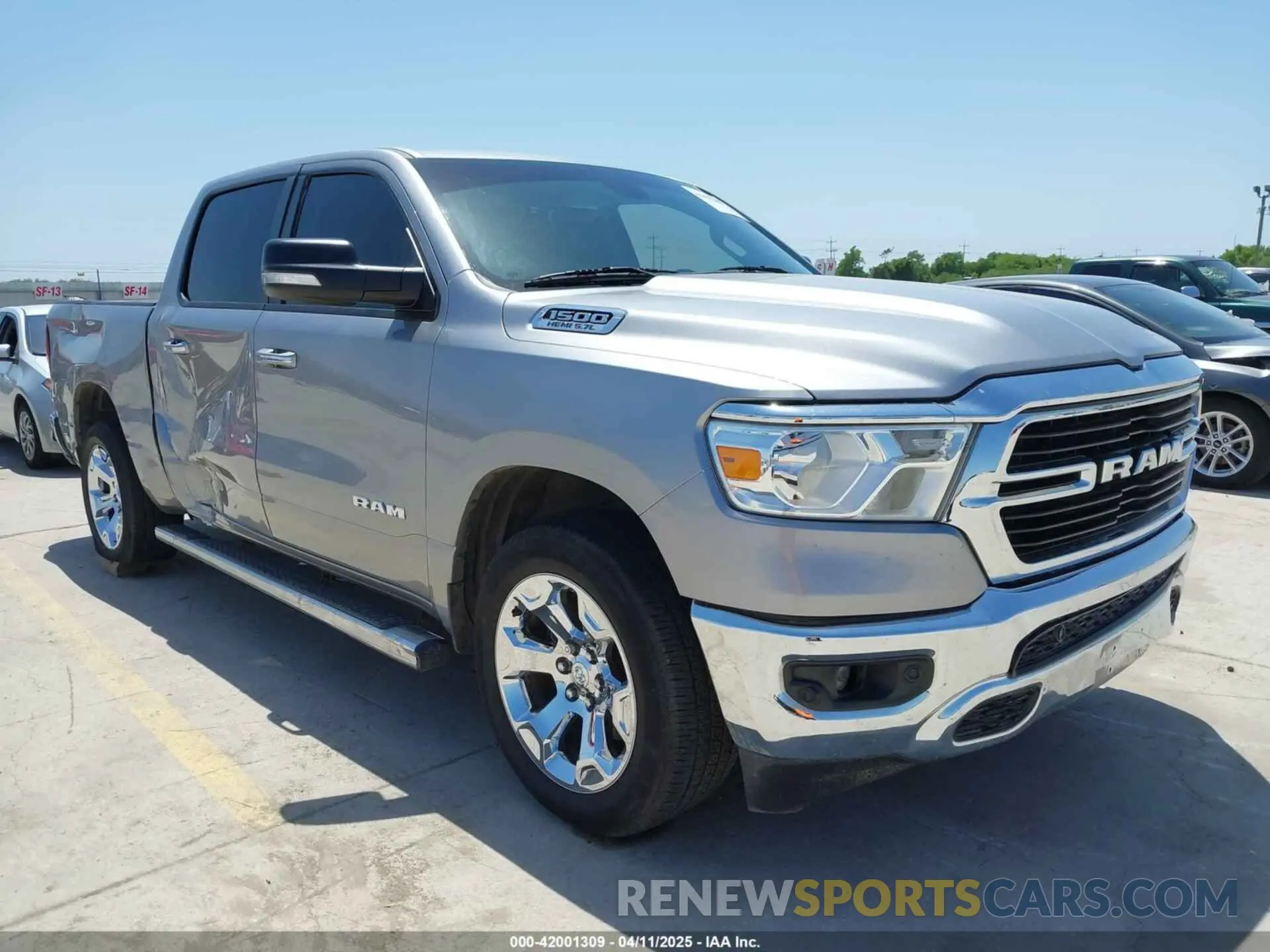 1 Photograph of a damaged car 1C6RREFT3LN321573 RAM 1500 2020
