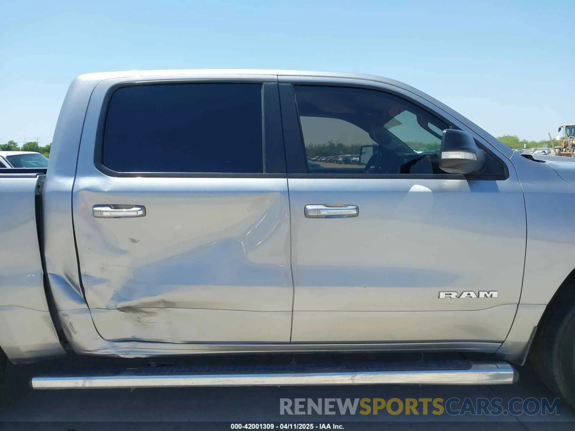 13 Photograph of a damaged car 1C6RREFT3LN321573 RAM 1500 2020