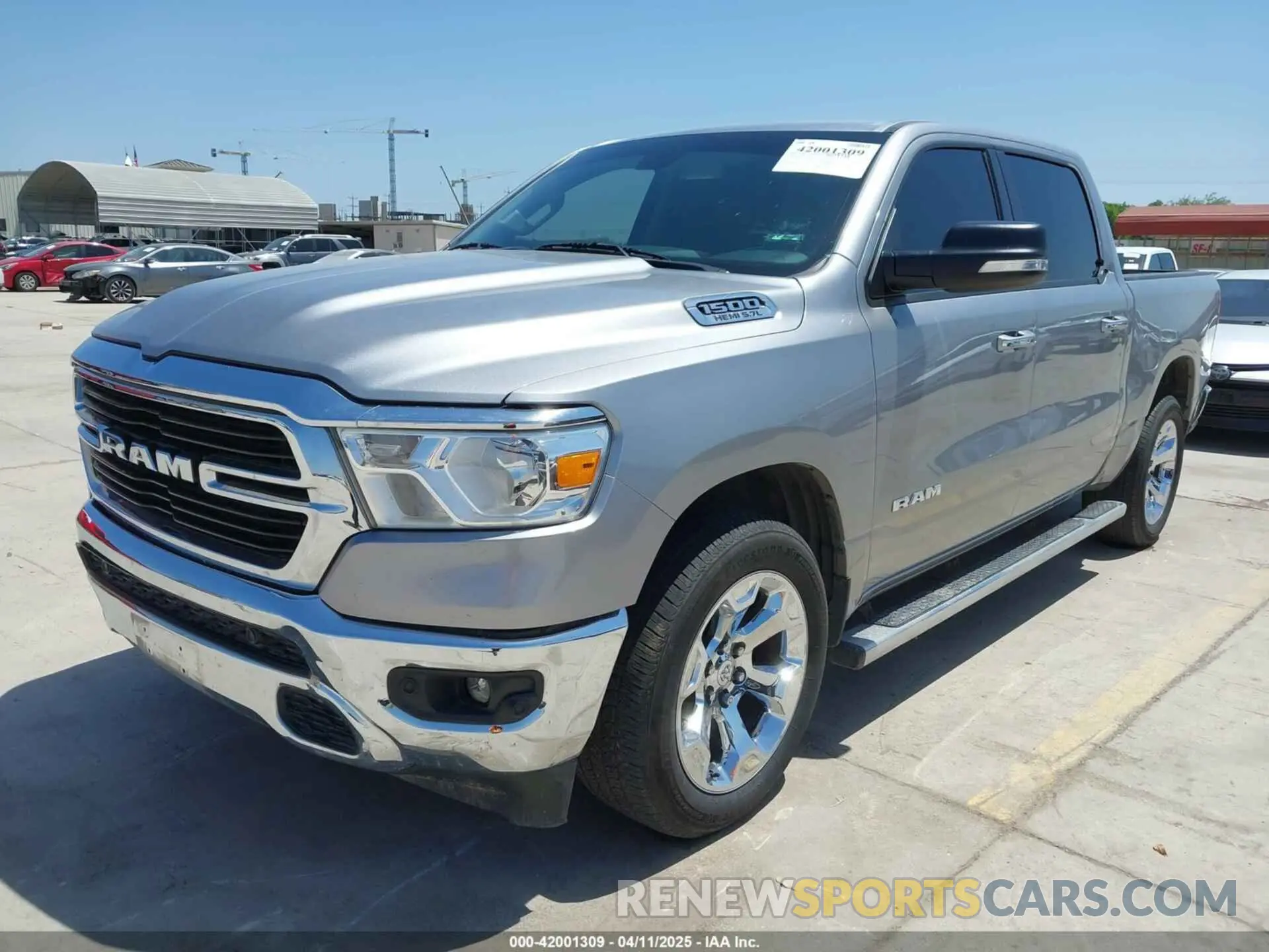 2 Photograph of a damaged car 1C6RREFT3LN321573 RAM 1500 2020