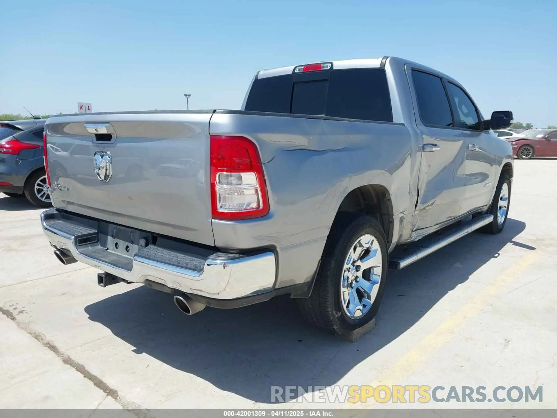 4 Photograph of a damaged car 1C6RREFT3LN321573 RAM 1500 2020