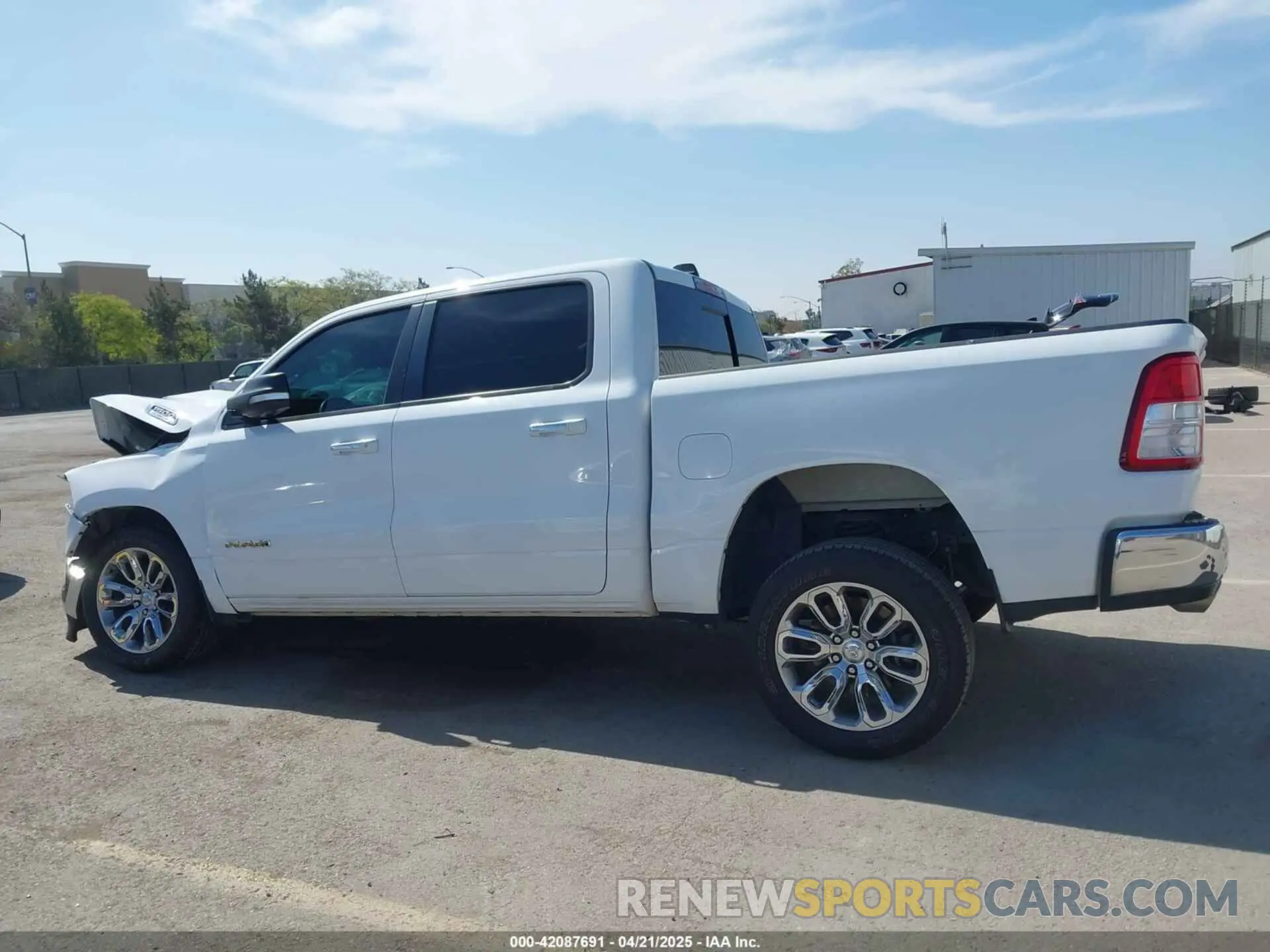 14 Photograph of a damaged car 1C6RREFT6LN100386 RAM 1500 2020