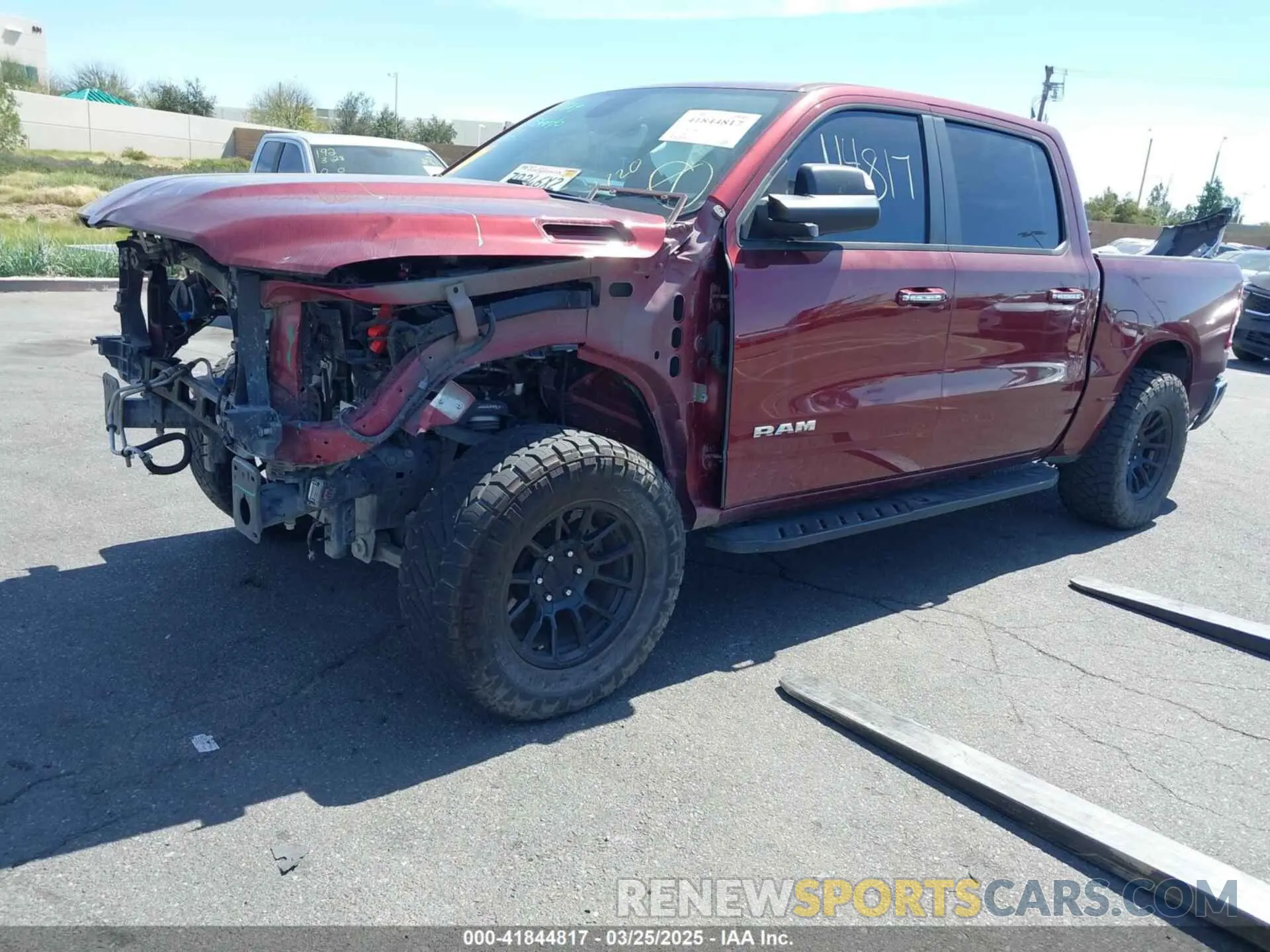 2 Photograph of a damaged car 1C6RREFT7LN105581 RAM 1500 2020