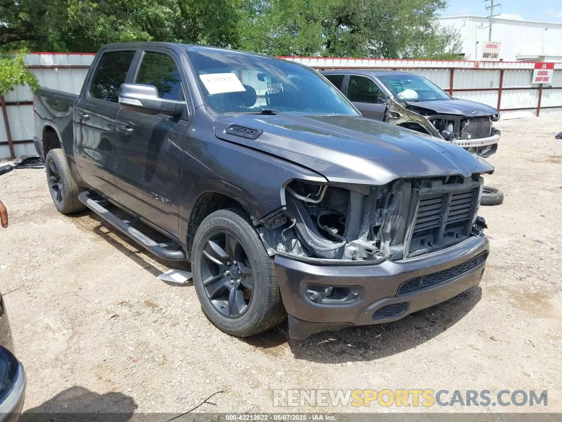 1 Photograph of a damaged car 1C6RREFT7LN121697 RAM 1500 2020