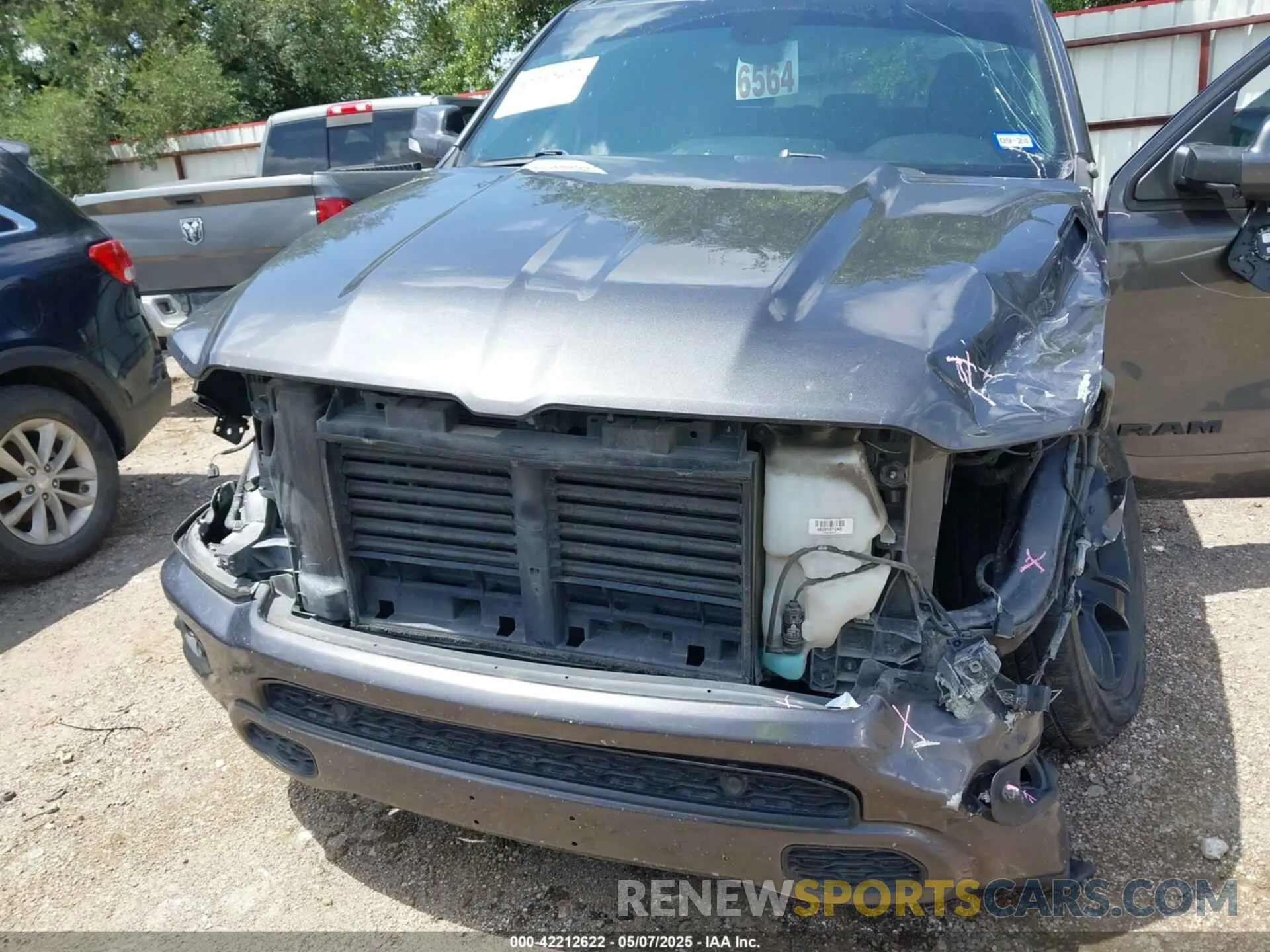 19 Photograph of a damaged car 1C6RREFT7LN121697 RAM 1500 2020