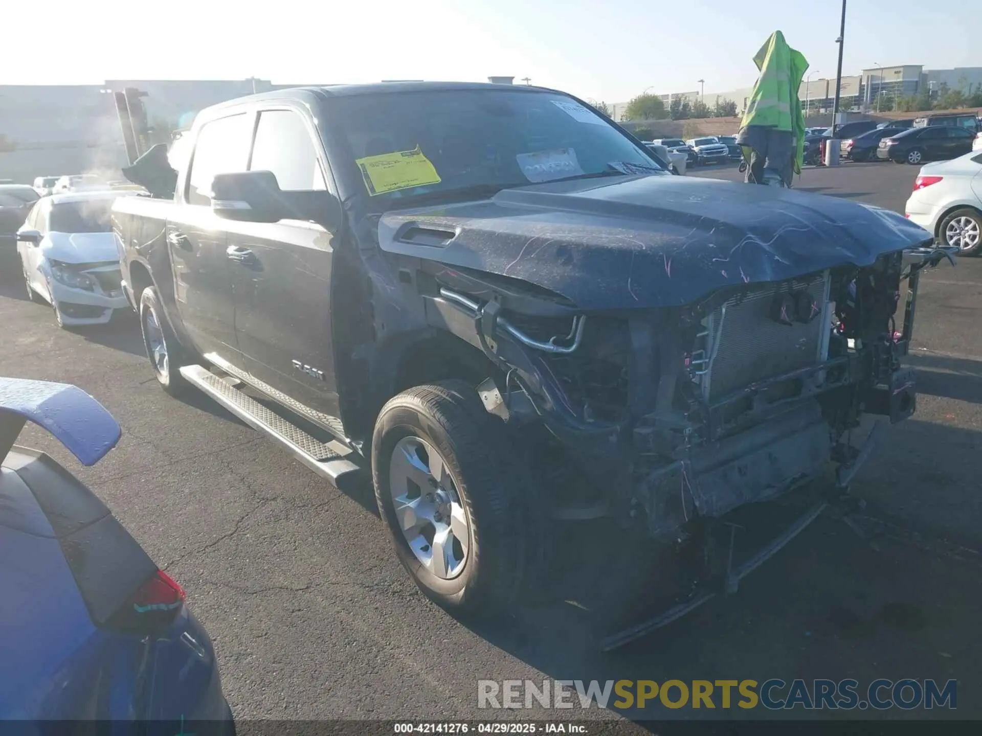 1 Photograph of a damaged car 1C6RREFT7LN401927 RAM 1500 2020