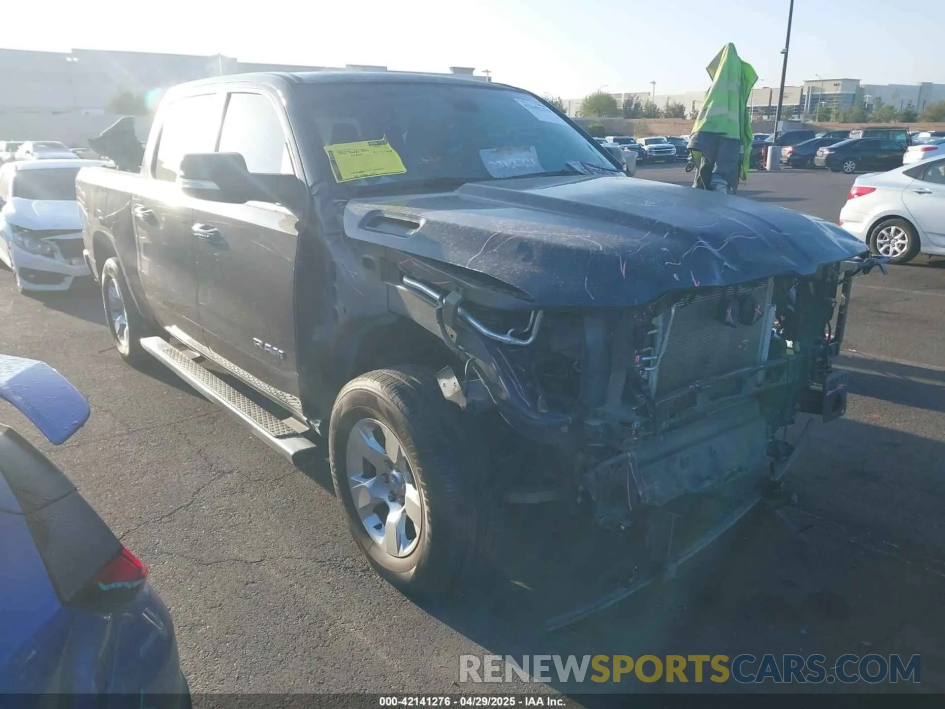 14 Photograph of a damaged car 1C6RREFT7LN401927 RAM 1500 2020