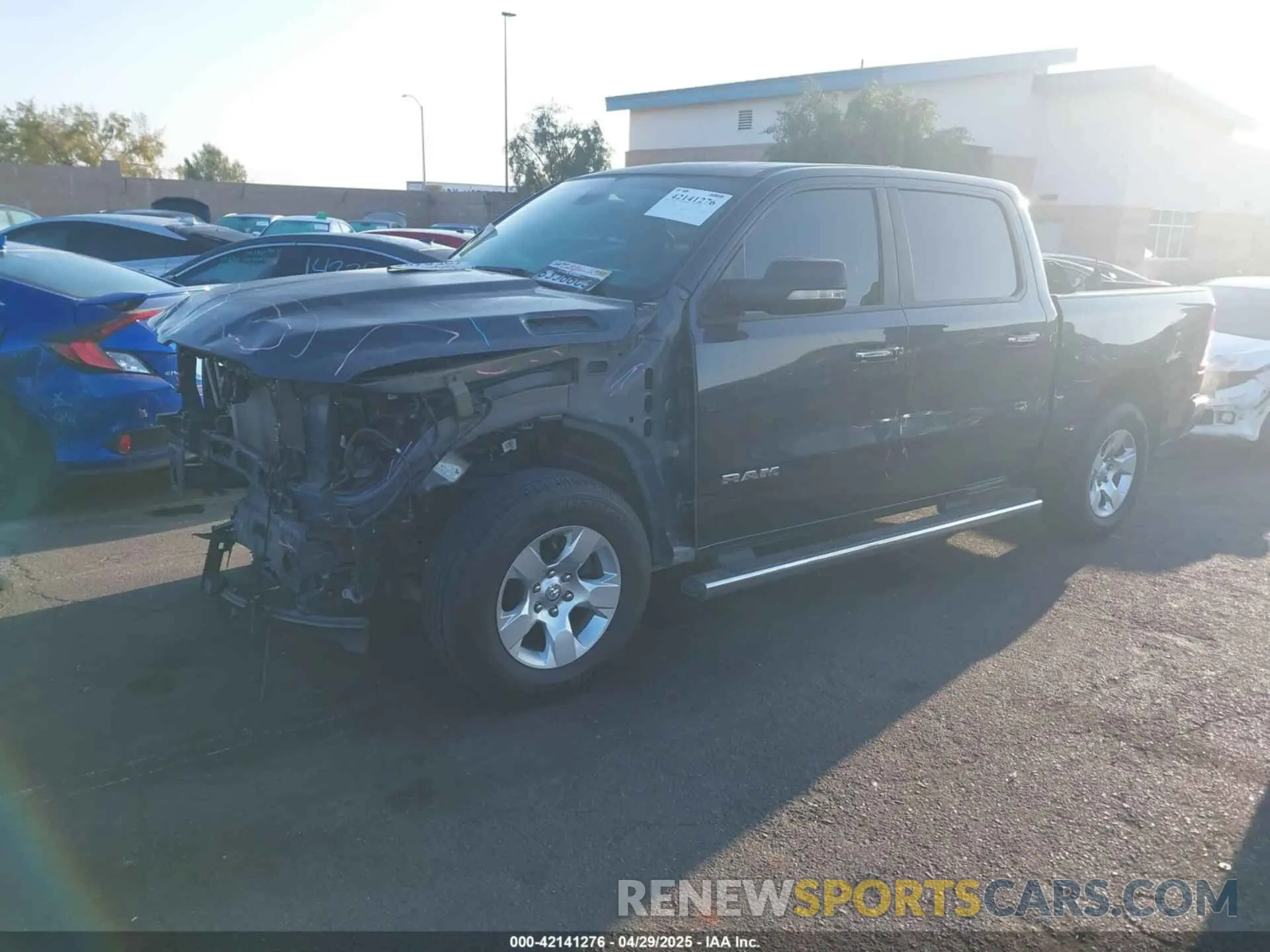 2 Photograph of a damaged car 1C6RREFT7LN401927 RAM 1500 2020