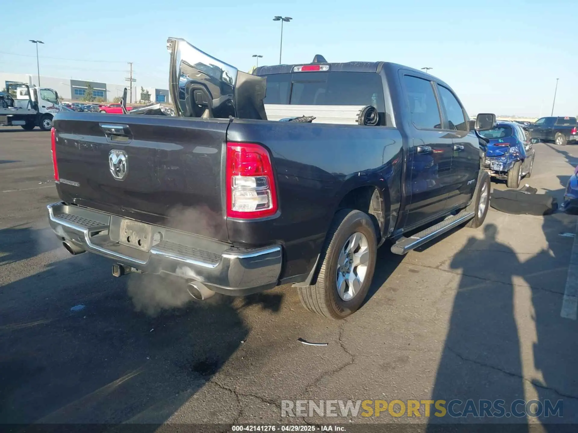 4 Photograph of a damaged car 1C6RREFT7LN401927 RAM 1500 2020