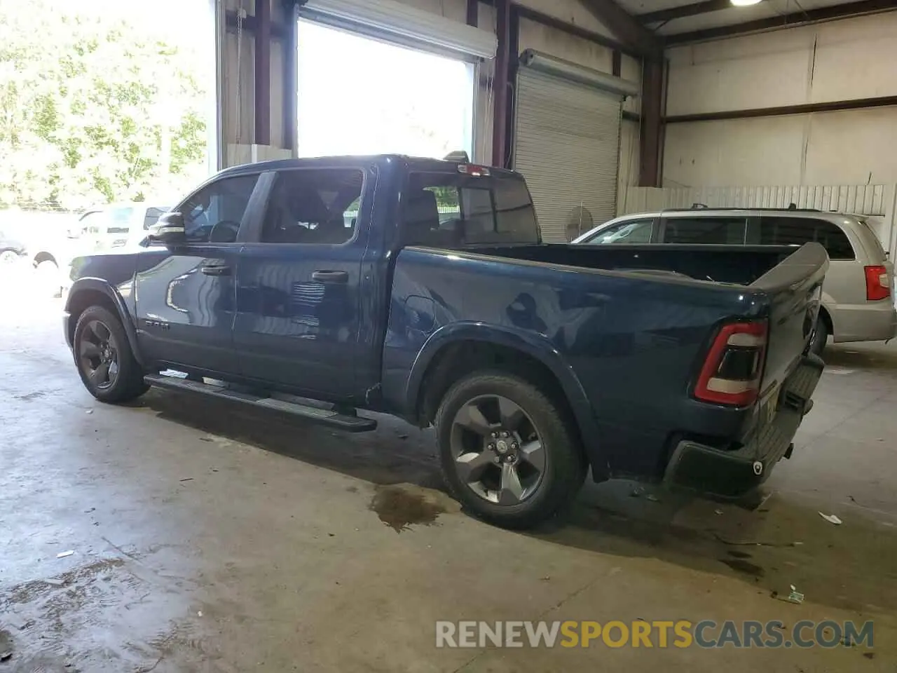 2 Photograph of a damaged car 1C6RREFTXLN373007 RAM 1500 2020