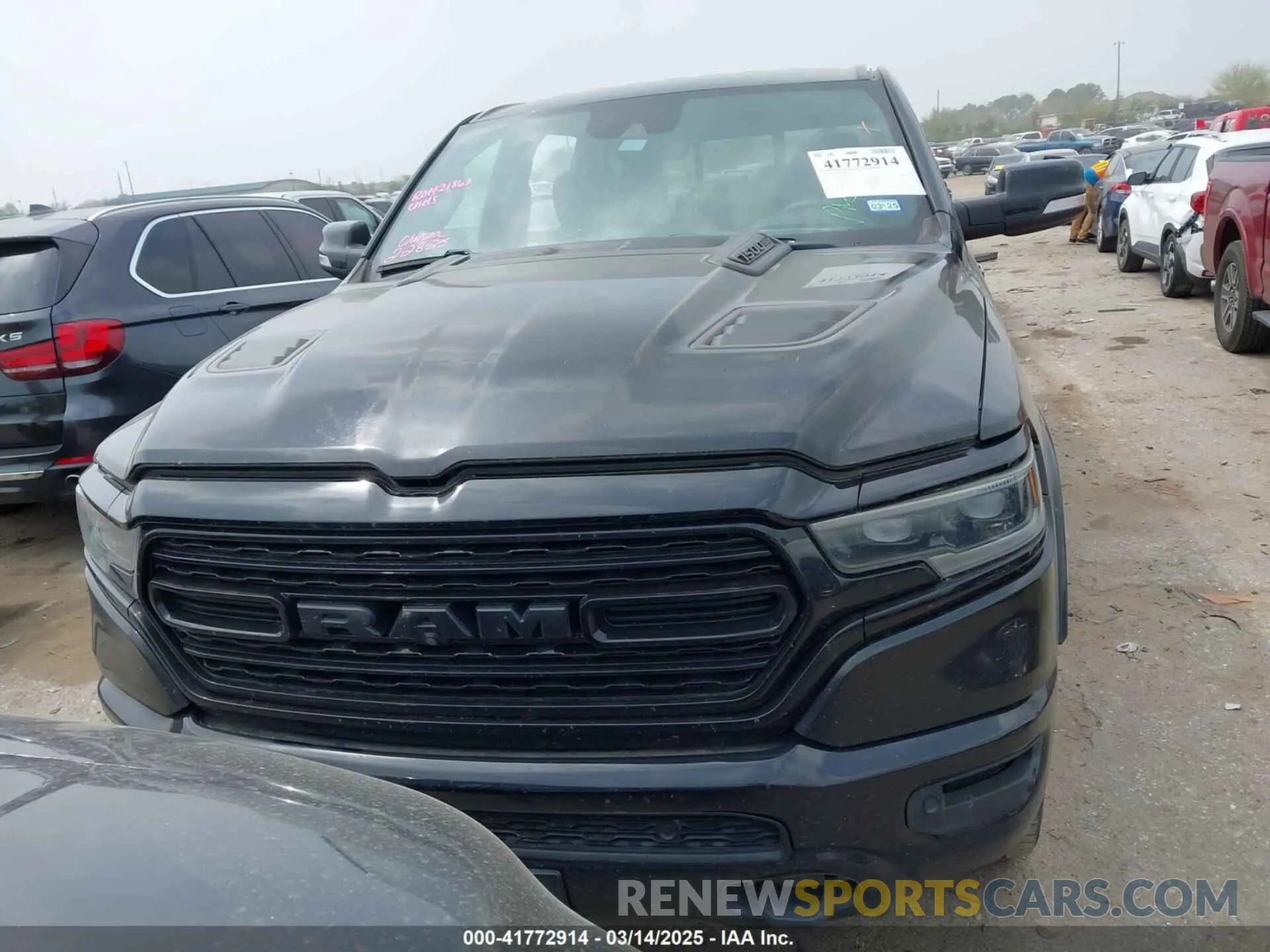 13 Photograph of a damaged car 1C6RREHT9LN143519 RAM 1500 2020