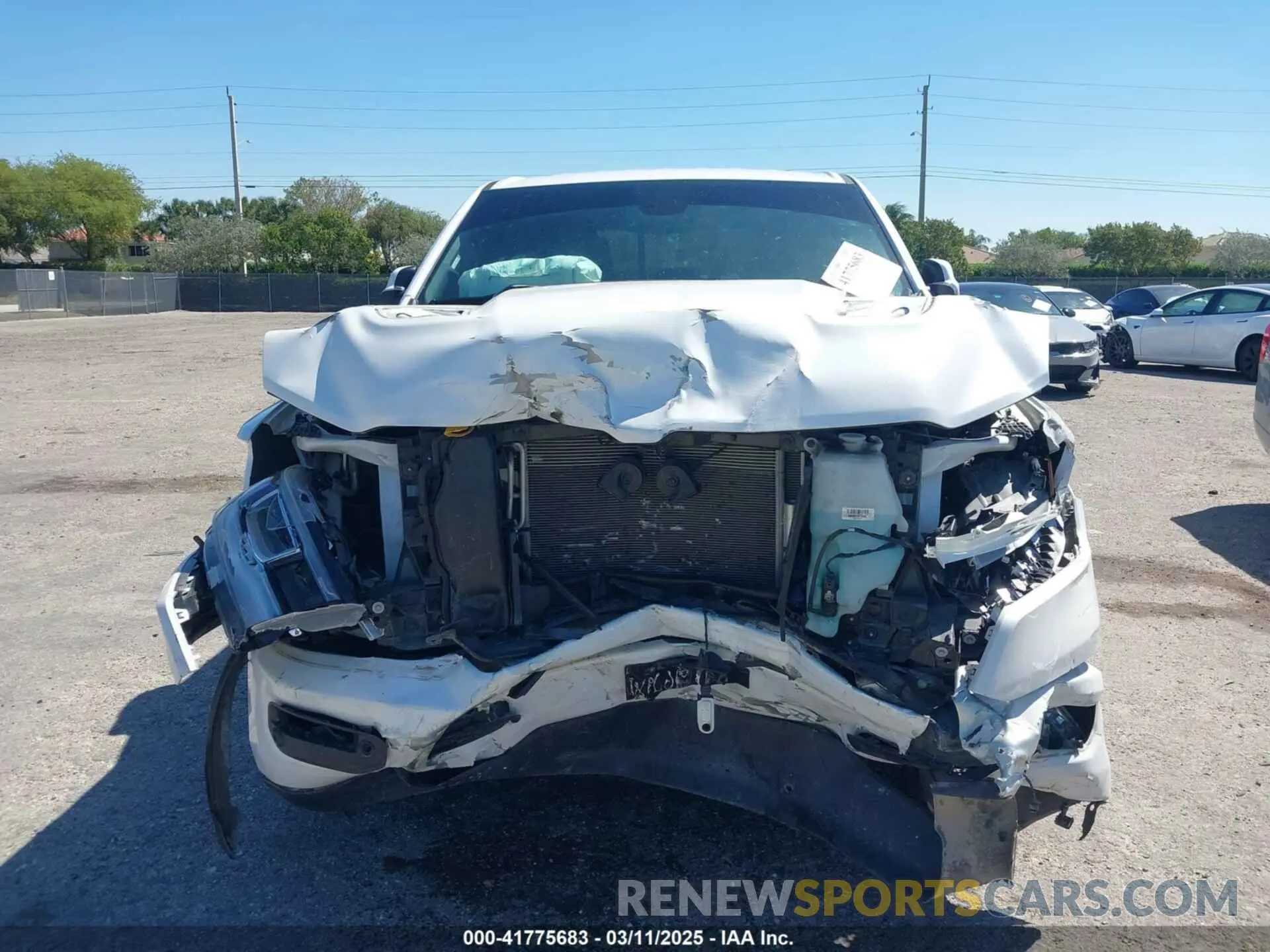 13 Photograph of a damaged car 1C6RREJT6LN188640 RAM 1500 2020